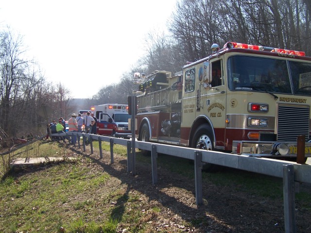E-105 on scene, Saw Mill River Parkway north bound - single car roll over - March 2006