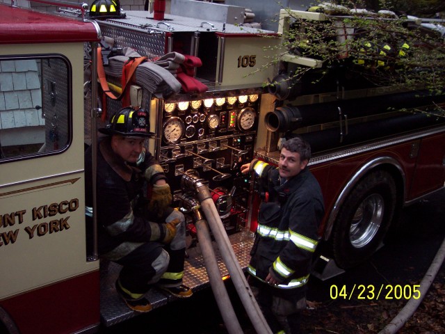 Peter Hughes Jr. pumps E-105 as Mike Brady takes a breather - Yeshiva April 2005