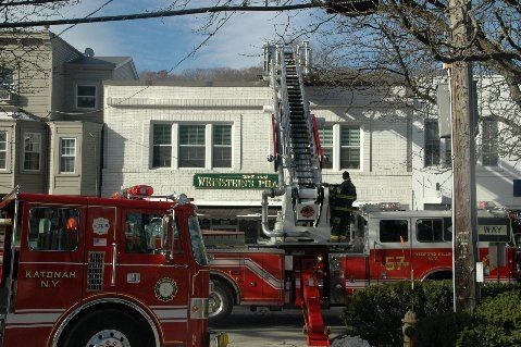 Bedford Hills T-57 in front of 95 Katonah Avenue