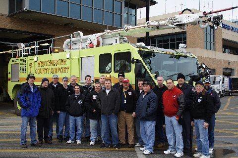 IFCO members pose with Crash Rescue 7 at WC Airport. (12/14/07)