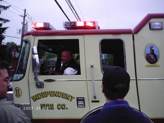 IFCO Ex-Commissioner John Marshall III backs E-106 into Station 3.