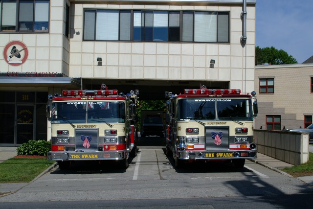 E-105 and E-106 (retired) in front of quarters