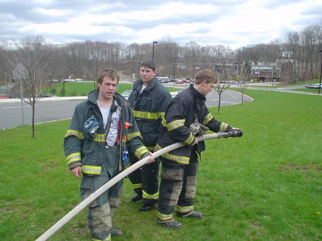 FLHS First Responders Club members operate handline from E-105. (4/23/09)