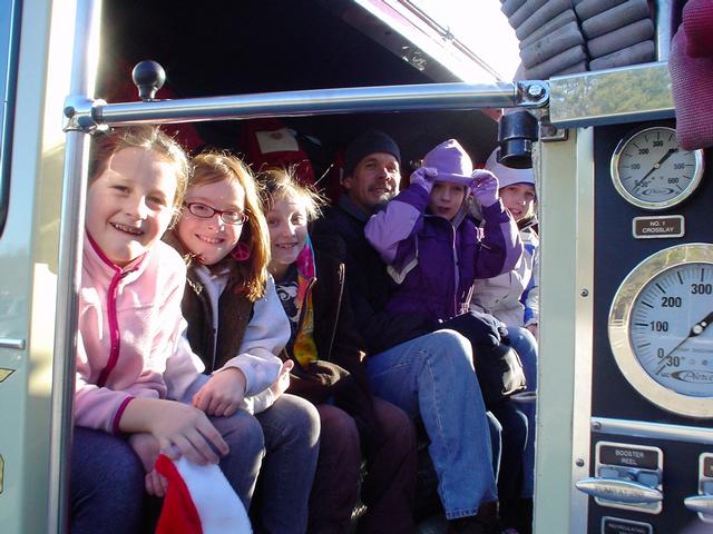 Fire truck riders on E-105 ready to roll to the American Legion. X-mas rides (12/12/09)
