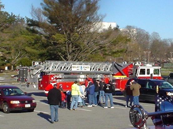 Fire Truck riders greet Santa as he arrives at Leonard Park. X-mas rides (12/12/09)