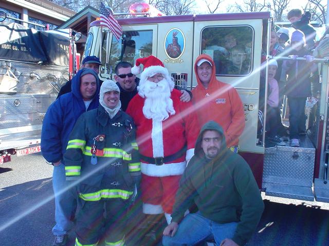 IFCO Members pose with Santa Clause at Leonard Park before their trip downtown. X-mas rides (12/12/09)