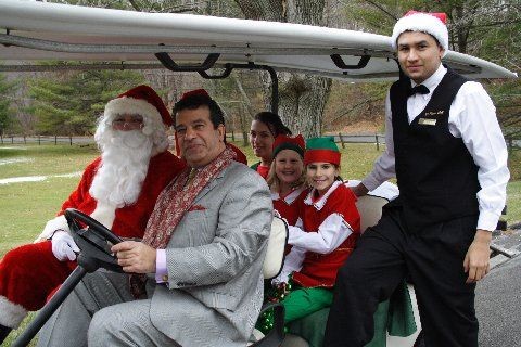 Santa gets escorted in private golf cart at Mount Kisco Country Club 